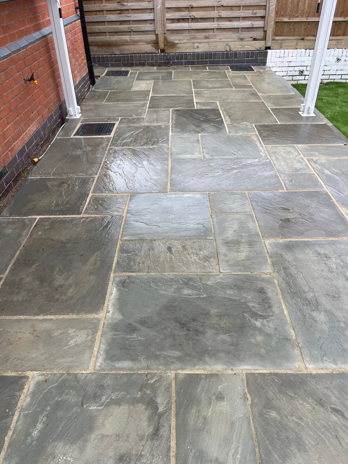 Patio cleaning result - sandstone patio cleaned